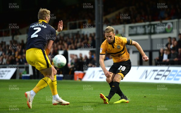 280818 - Newport County v Oxford United - Carabao Cup - Mickey Demetriou of Newport County crosses the ball