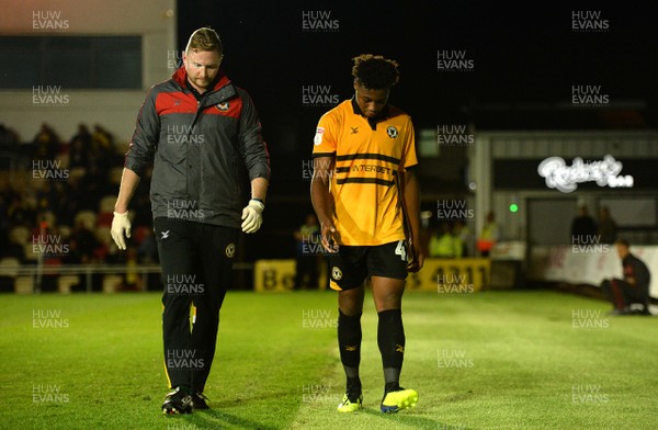 280818 - Newport County v Oxford United - Carabao Cup - Antoine Semenyo of Newport County leaves the field with medical staff