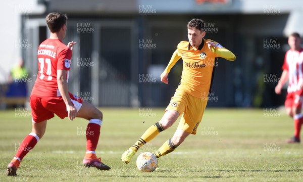 220417 - Newport County v Accrington Stanley - SkyBet League 2 - Mark Randall of Newport County is tackled by Sean McConville of Accrington Stanley