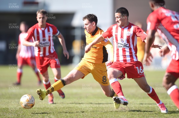 220417 - Newport County v Accrington Stanley - SkyBet League 2 - Mark Randall of Newport County is tackled by Noor Husin of Accrington Stanley