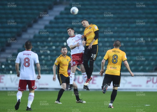 240418 - Newport County v Accrington Stanley - SkyBet League 2 - Billy Kee of Accrington Stanley and Mickey Demetriou of Newport County compete
