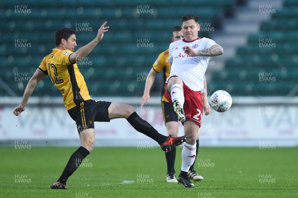 240418 - Newport County v Accrington Stanley - SkyBet League 2 - Ben Tozer of Newport County and Billy Kee of Accrington Stanley compete