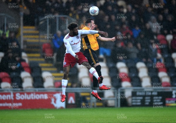 240418 - Newport County v Accrington Stanley - SkyBet League 2 - Janoi Donacien of Accrington Stanley and Robbie Willmott of Newport County compete