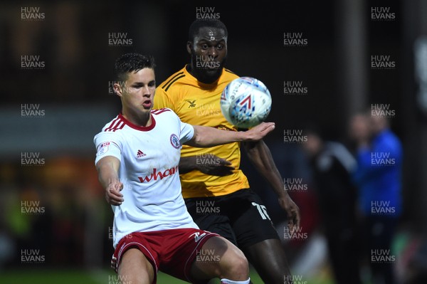 240418 - Newport County v Accrington Stanley - SkyBet League 2 - Callum Johnson of Accrington Stanley is challenged by Frank Nouble of Newport County