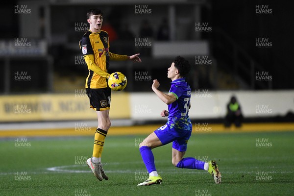 270126 - Newport County v Accrington Stanley - Sky Bet League 2 - Joe Thomas of Newport County is challenged by Isaac Heath of Accrington