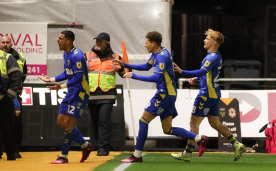 140323 - Newport County v AFC Wimbledon, EFL Sky Bet League 2 - Ali Al-Hamadi of AFC Wimbledon, left, celebrates after scoring goal