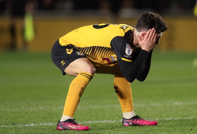 140323 - Newport County v AFC Wimbledon, EFL Sky Bet League 2 - Calum Kavanagh of Newport County reacts after missing a chance to score