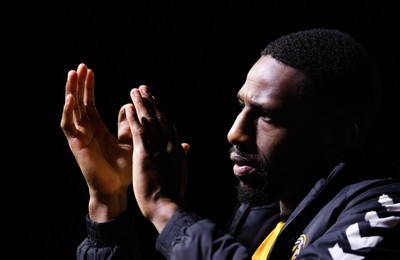 140323 - Newport County v AFC Wimbledon, EFL Sky Bet League 2 - Omar Bogle of Newport County applauds the fans at the end of the match