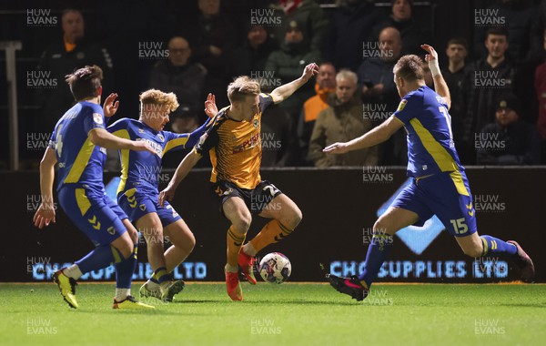 140323 - Newport County v AFC Wimbledon, EFL Sky Bet League 2 - Harry Charsley of Newport County is closed down by the Wimbledon defence