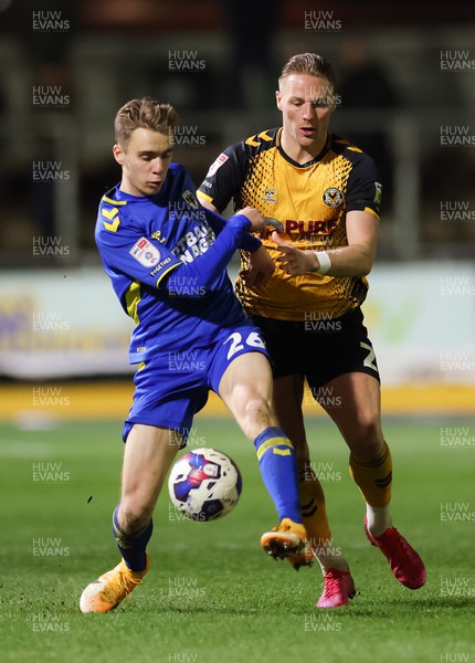 140323 - Newport County v AFC Wimbledon, EFL Sky Bet League 2 - Cameron Norman of Newport County takes on Jack Currie of AFC Wimbledon