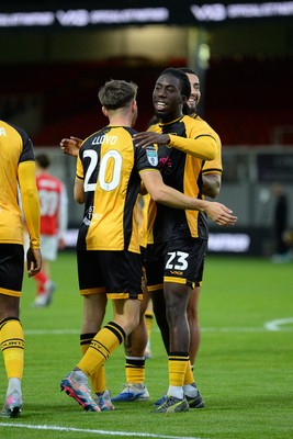 230925 - Newport County v Arsenal U21 - Vertu Trophy - Ben Lloyd of Newport County celebrates scoring a goal with team mates
