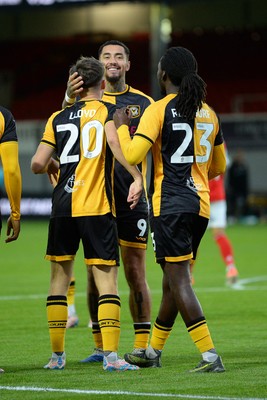 230925 - Newport County v Arsenal U21 - Vertu Trophy - Ben Lloyd of Newport County celebrates scoring a goal with team mates