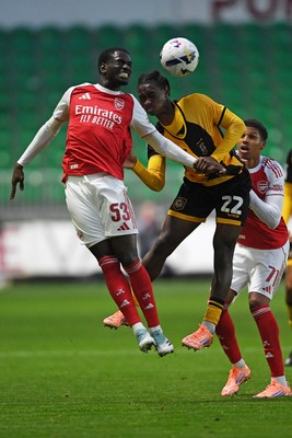 230925 - Newport County v Arsenal U21 - Vertu Trophy - Habeeb Ogunneye of Newport County is challenged by Charles Sagoe Jr
