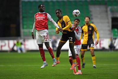 230925 - Newport County v Arsenal U21 - Vertu Trophy - Habeeb Ogunneye of Newport County is challenged by Charles Sagoe Jr