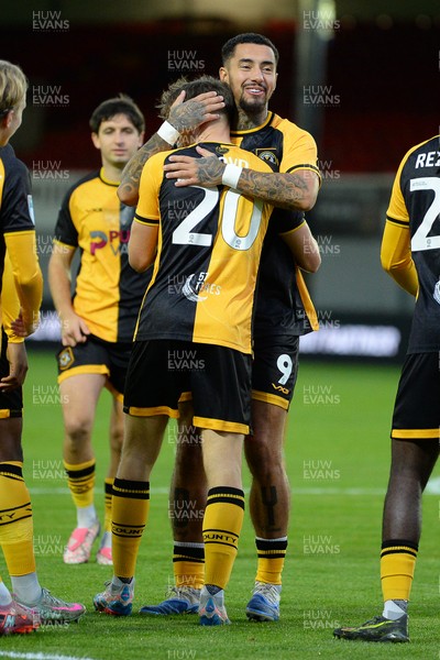 230925 - Newport County v Arsenal U21 - Vertu Trophy - Ben Lloyd of Newport County celebrates scoring a goal with team mates