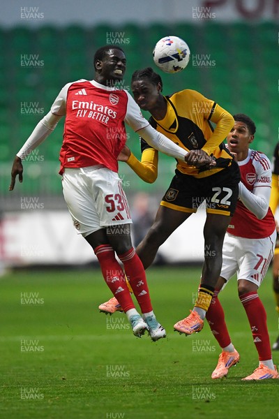 230925 - Newport County v Arsenal U21 - Vertu Trophy - Habeeb Ogunneye of Newport County is challenged by Charles Sagoe Jr