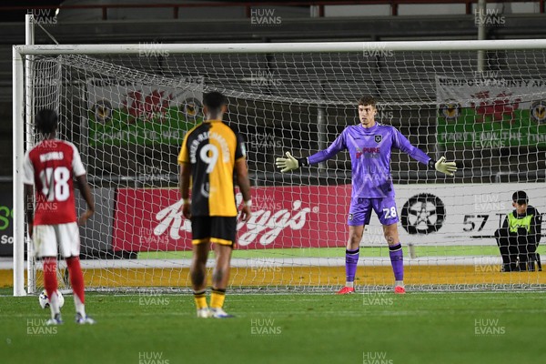 230925 - Newport County v Arsenal U21 - Vertu Trophy - Jordan Wright of Newport County saves the penalty from Harriman-Annous of Arsenal U21s