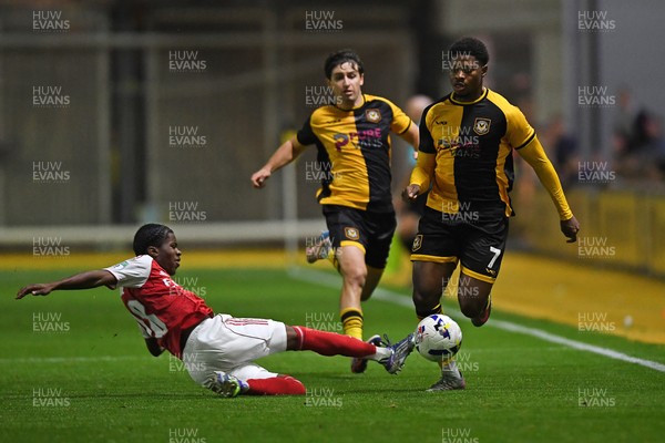 230925 - Newport County v Arsenal U21 - Vertu Trophy - Bobby Kamwa of Newport County is tackled by Josh Nicols of Arsenal U21s