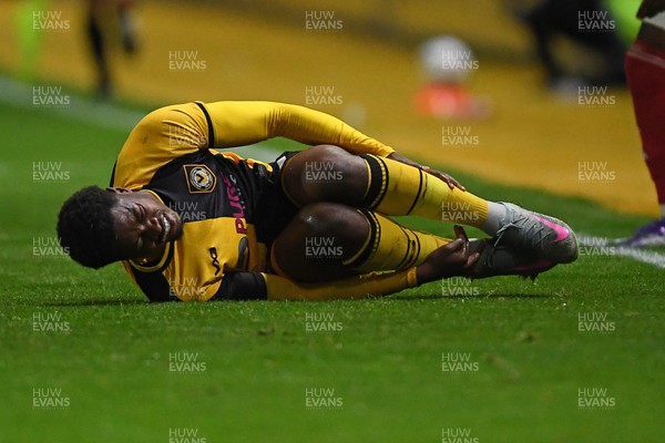 230925 - Newport County v Arsenal U21 - Vertu Trophy - Bobby Kamwa of Newport County is tackled by Josh Nicols of Arsenal U21s