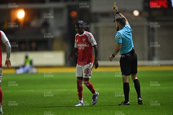 230925 - Newport County v Arsenal U21 - Vertu Trophy -  Josh Nicols of Arsenal U21s is shown a yellow card