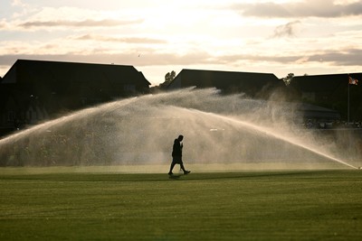 040826 - Newport County v AS Roma - Pre-Season Friendly - The groundsman on the pitch at half time