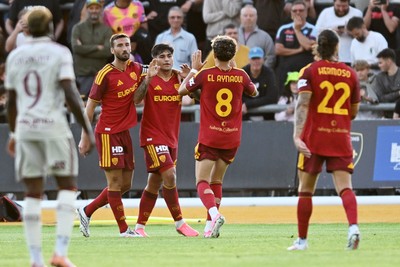 040826 - Newport County v AS Roma - Pre-Season Friendly - Santiago Castro of Roma celebrates scoring a goal with team mates