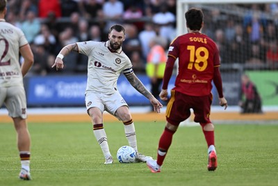 040826 - Newport County v AS Roma - Pre-Season Friendly - Kyle Cameron of Newport County is challenged by Matias Soule of Roma