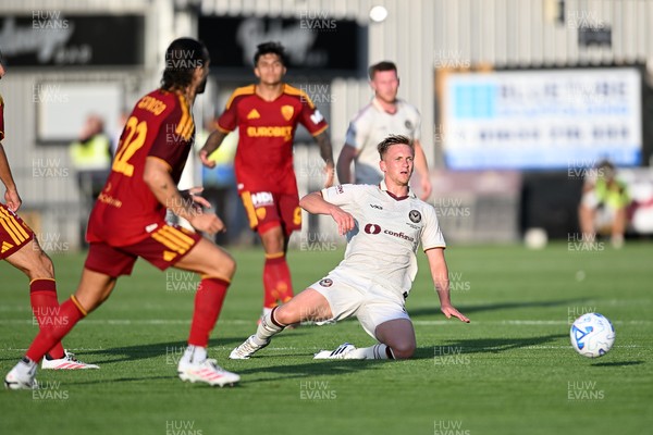 040826 - Newport County v AS Roma - Pre-Season Friendly - Matt Smith of Newport County is challenged by Mario Hermoso of Roma