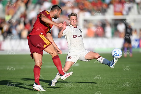 040826 - Newport County v AS Roma - Pre-Season Friendly - Matt Smith of Newport County is challenged by Gianluca Mancini of Roma