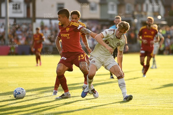 040826 - Newport County v AS Roma - Pre-Season Friendly - Tom Davies of Newport County is challenged by Gianluca Mancini of Roma