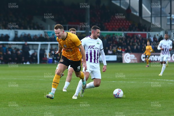 021223 - Newport County v Barnet - FA Cup Second Round - Bryn Morris of Newport County is dispossessed by Anthony Hartigan of Barnet
