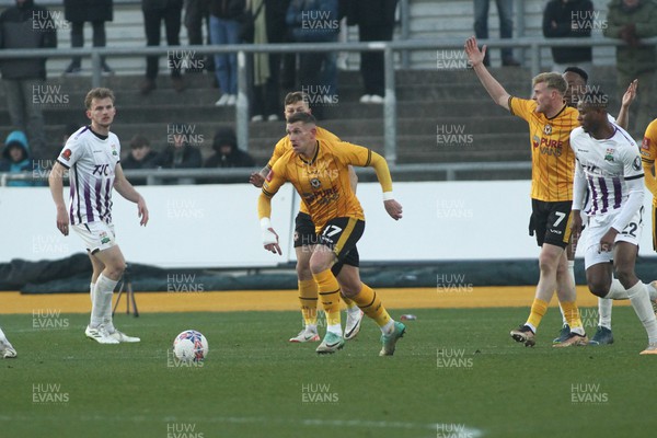 021223 - Newport County v Barnet - FA Cup Second Round - Scot Bennett of Newport County runs the ball out of defence