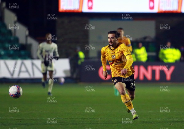 021223 - Newport County v Barnet - FA Cup Second Round - Aaron Wildig of Newport County chases a through ball