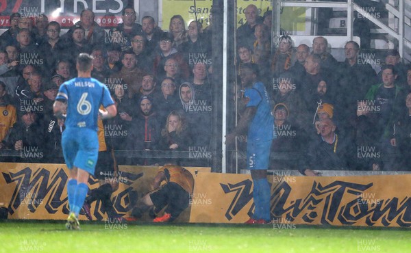 211117 - Newport County v Barnet - SkyBet League Two - Ricardo Santos of Barnet looks on after pushing Robbie Willmott of Newport County into the ad boards