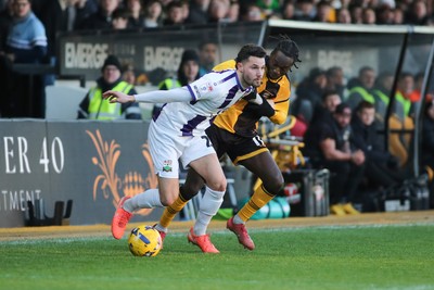 261225 - Newport County v Barnet - Sky Bet League 2 - Cameron Antwi of Newport County puts pressure on Nikola Tavares of Barnet
