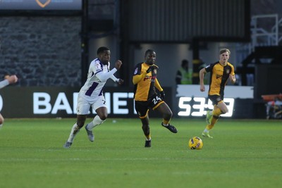 261225 - Newport County v Barnet - Sky Bet League 2 - Nathaniel Opoku of Newport County takes on Nnamdi Ofoborth of Barnet