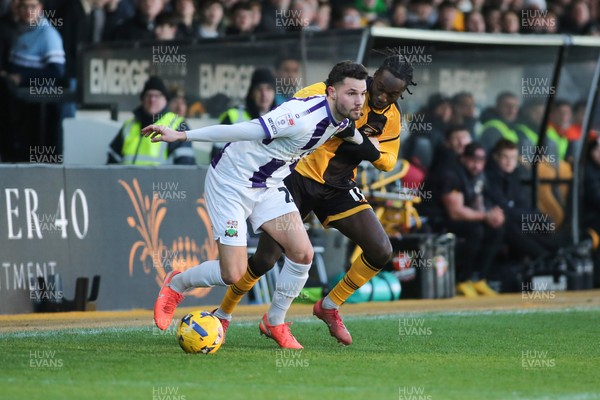 261225 - Newport County v Barnet - Sky Bet League 2 - Cameron Antwi of Newport County puts pressure on Nikola Tavares of Barnet