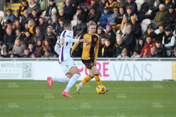 261225 - Newport County v Barnet - Sky Bet League 2 - Sammy Braybrooke of Newport County takes on  Joe Kizzi of Barnet