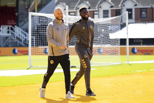170922 - Newport County v Barrow - Sky Bet League 2 - Newport County manager James Rowberry with Offrande Zanzala of Newport County ahead of the match