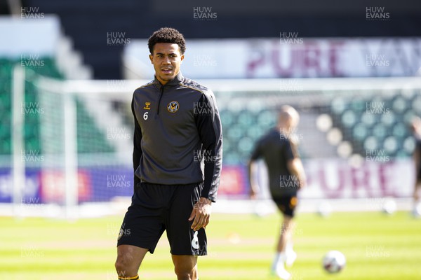 170922 - Newport County v Barrow - Sky Bet League 2 - Priestley Farquharson of Newport County during the warm up