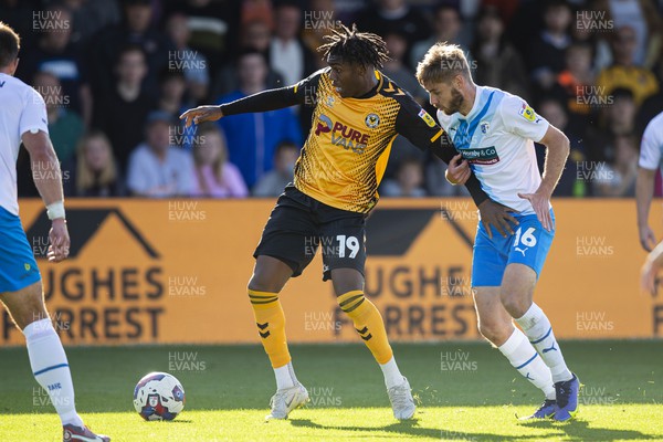 170922 - Newport County v Barrow - Sky Bet League 2 - Thierry Nevers of Newport County in action against Sam Foley of Barrow
