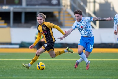 291125 - Newport County v Barrow - Sky Bet League 2 - Samuel Braybrooke of Newport County holds off Charlie McCann of Barrow