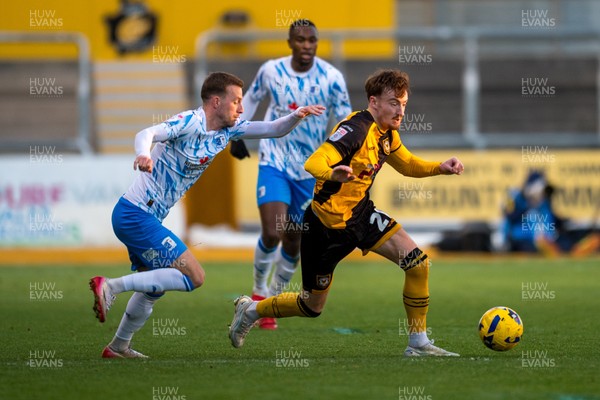 291125 - Newport County v Barrow - Sky Bet League 2 - Michael Spellman of Newport County beats Elliot Newby of Barrow