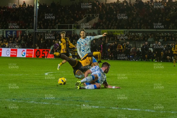 291125 - Newport County v Barrow - Sky Bet League 2 - Nathaniel Opoku of Newport County is tackled by Niall Canavan of Barrow
