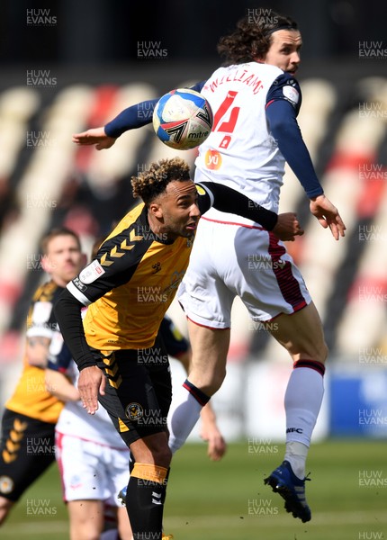 050421 - Newport County v Bolton Wanderers - EFL SkyBet League 2 - Nicky Maynard of Newport County and Jordan Williams of Bolton compete