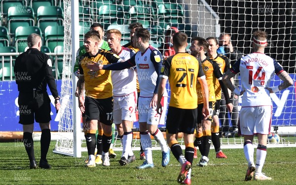 050421 - Newport County v Bolton Wanderers - EFL SkyBet League 2 - Both sets of players confront the referee in the goalmouth at the end of the game
