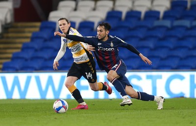 090321 Newport County v Bradford City, Sky Bet League 2 - Aaron Lewis of Newport County and Levi Sutton of Bradford City compete for the ball