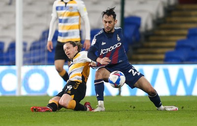 090321 Newport County v Bradford City, Sky Bet League 2 - Aaron Lewis of Newport County and Levi Sutton of Bradford City compete for the ball