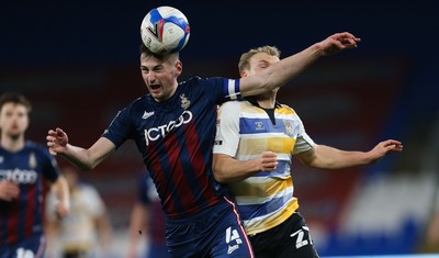 090321 Newport County v Bradford City, Sky Bet League 2 - Paudie O'Connor of Bradford City is challenged by Jake Scrimshaw of Newport County