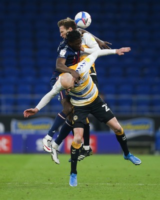 090321 Newport County v Bradford City, Sky Bet League 2 - Clayton Donaldson of Bradford City is caught between Kevin Ellison of Newport County and Mickey Demetriou of Newport County as they battle for the ball